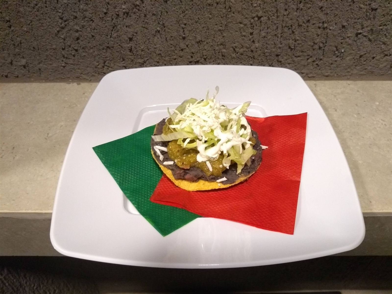 Tostada servida em jantar entre amigos na Savassi